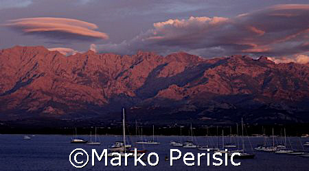 Sunset from the port of Calvi Corsica by Marko Perisic 